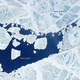Illustration for article titled Melt Ponds on Ice Sheets Are Chillingly Beautiful